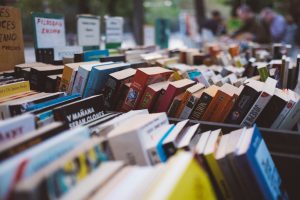 short fiction versus long: racks of books at bookstore